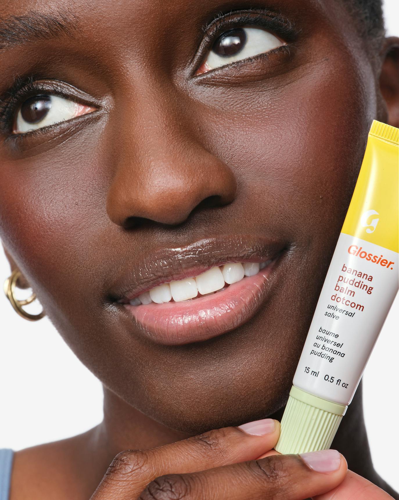 Mariama wears Banana Pudding Balm Dotcom.